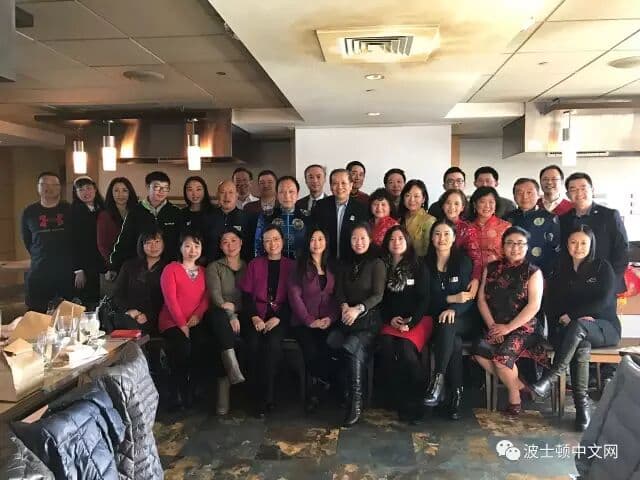 Group photograph of nearly 50 guests at the luncheon