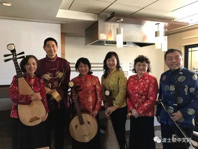 Musicians of the Xi Yang Yang folk ensemble in traditional dress